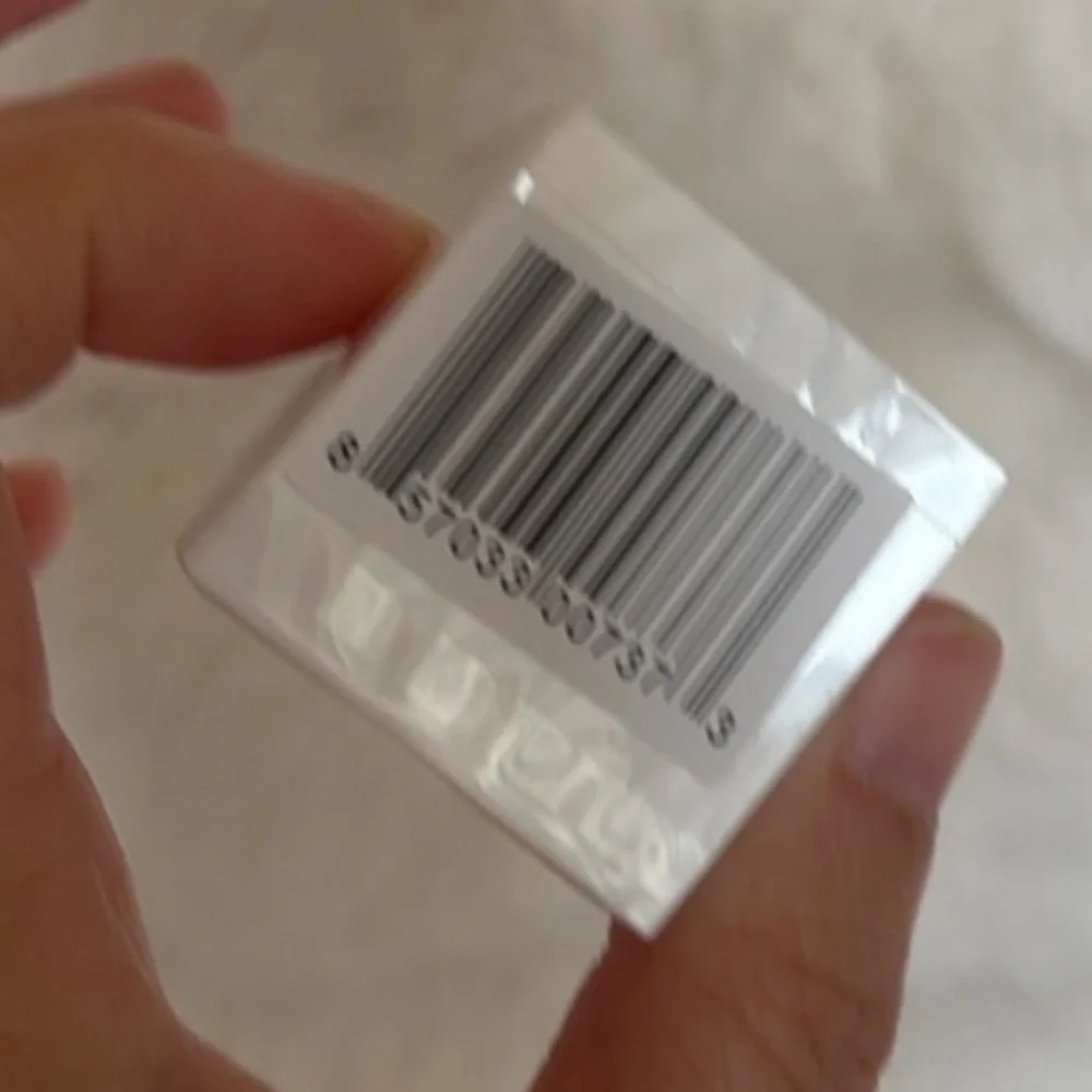 White eyeliner sharpener with Signature Logo